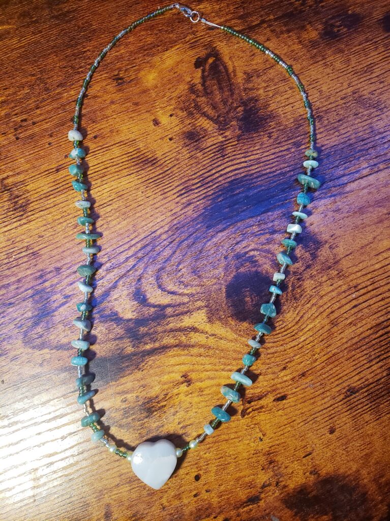 Light Blue Heart Surrounded by Teal Necklace