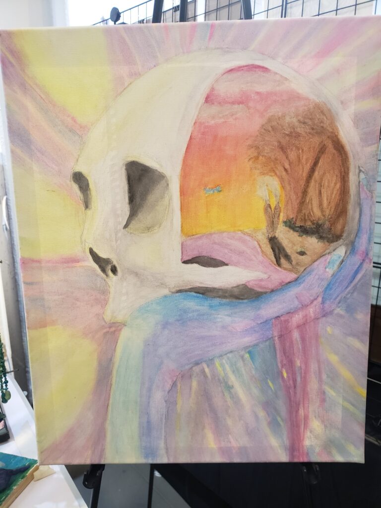 a bright neon painting of a bluehand holding a skull, inside the back of the skull is a scene of a shore at sunset. the water is tinted pin and flows out of teh skull, the trees curve like rib bones. there's a smoking piece of wood on the beach split partly in two like a couple.